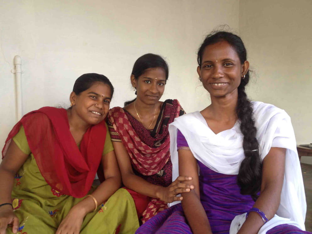 Reach for the Stars scholarship students (from left) Savithri and Suchithra, with graduate vaidegi