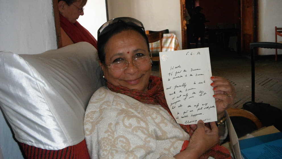 Hashi holding a letter from The Mother