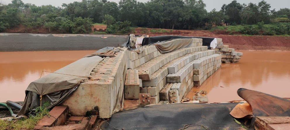 The ‘Lego block’ wall between sections 1 and 2 of the Matrimandir Lake broke in the middle and at the banks