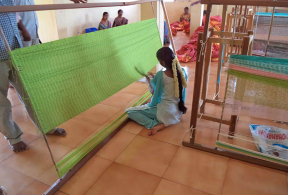 Women receiving training at an Auroville hammock making unit in Kottakarai