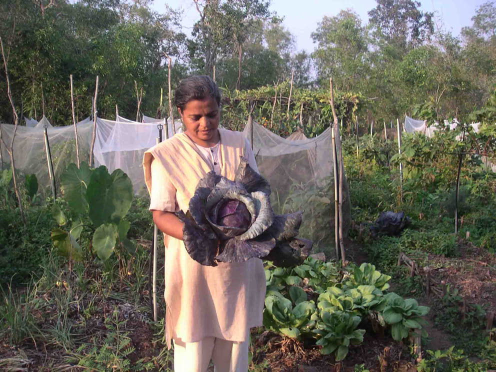 Deepika with a red cabbage