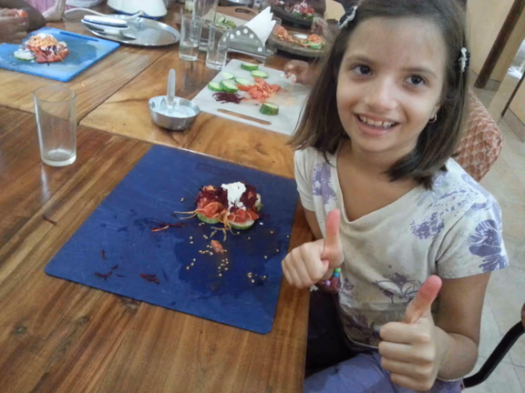 1 Food preparation in Anandi’s raw food restaurant - it tastes good!