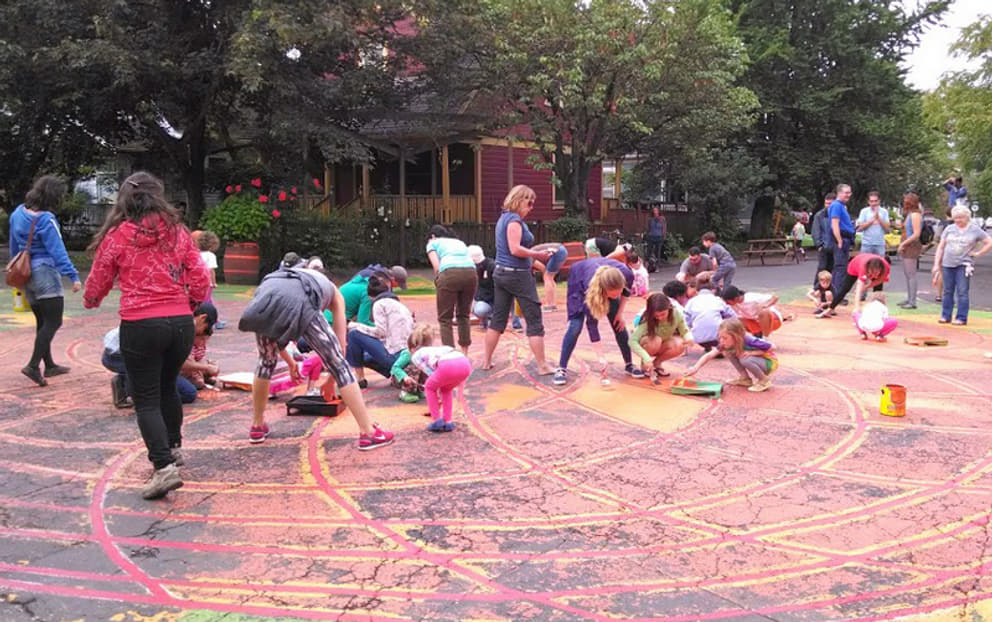 Local residnets in Portland, Oregon, USA, beautifying a public space