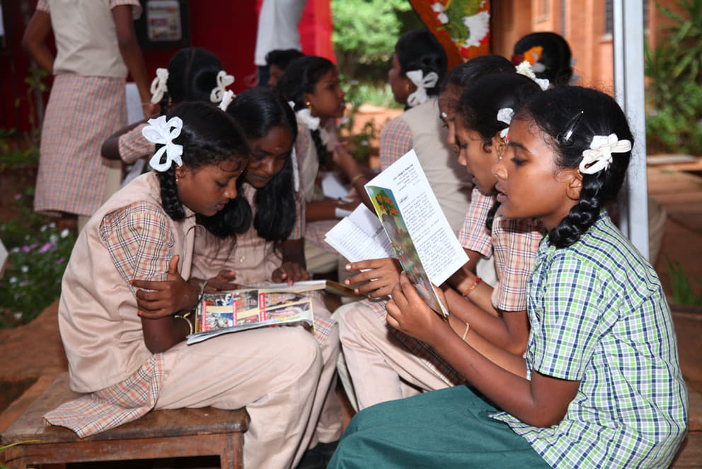 Bioregion students immersed in reading at the Book Fair
