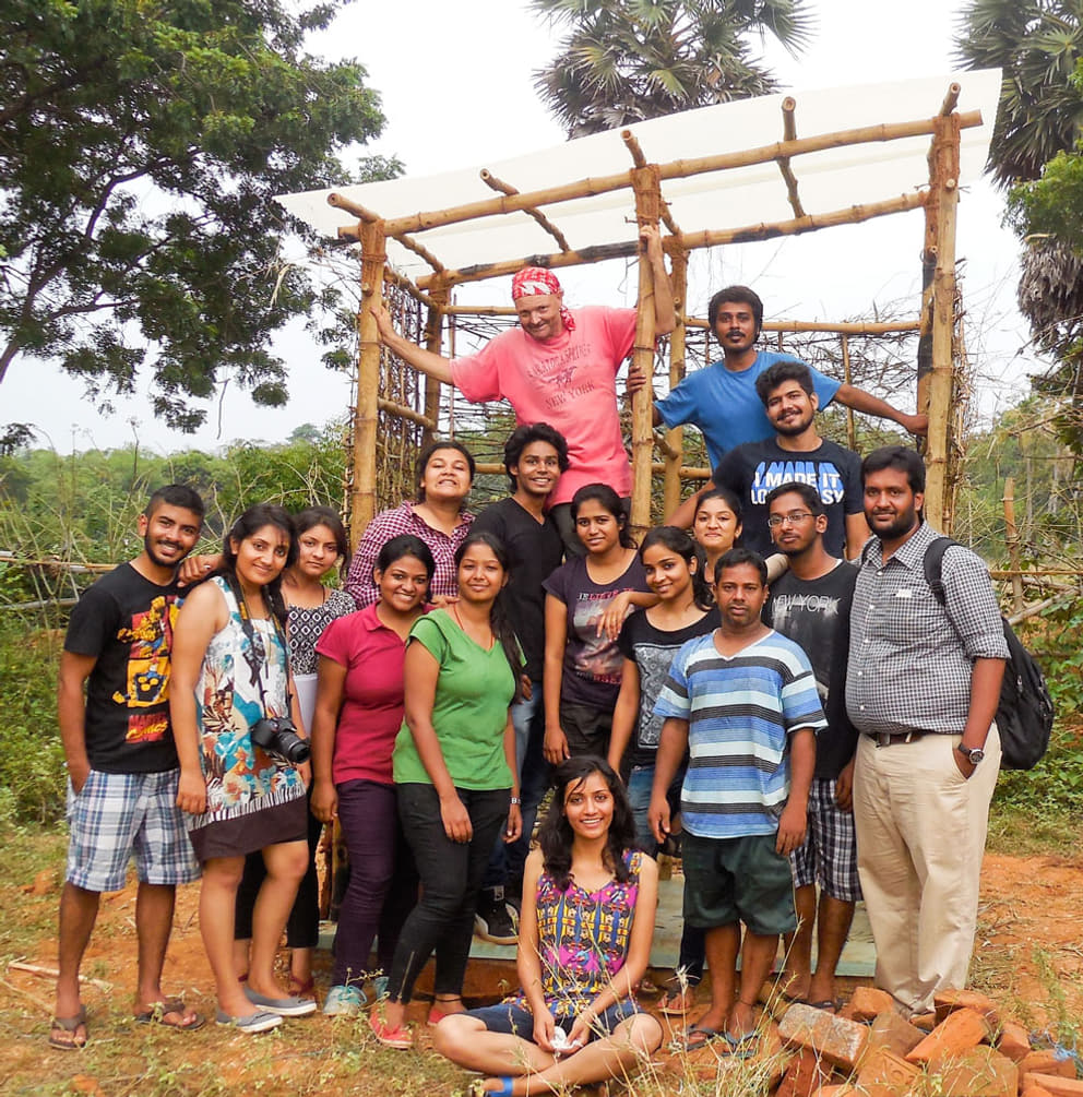 Participants of the Auroville World Bamboo Day in front of the prototype bamboo toilet