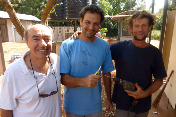 Louis (left) with two volunteers, Mariano and Christoff