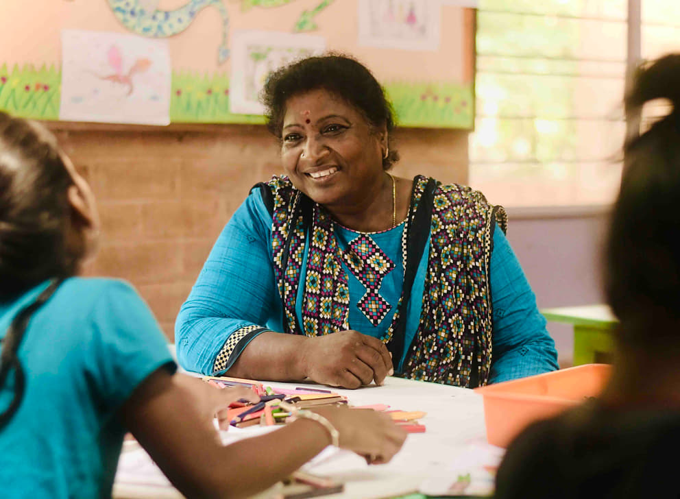 Amudha taking a class