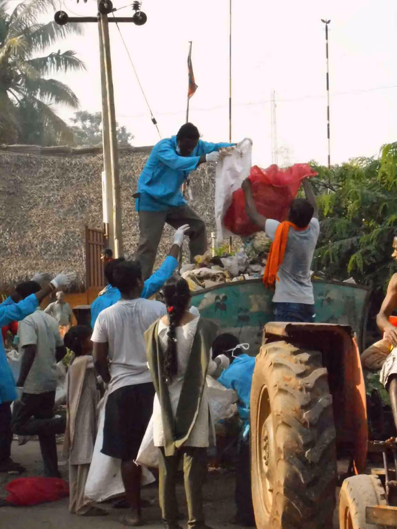 Loading trash on a cart