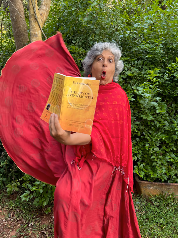 Fif Fernandes with her book The Joy of Living Lightly