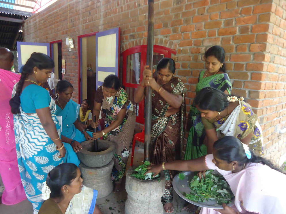 Women self-help group (SHG) members from across Tamil Nadu learning to prepare herbs based primary health care products as part of the SLI programme