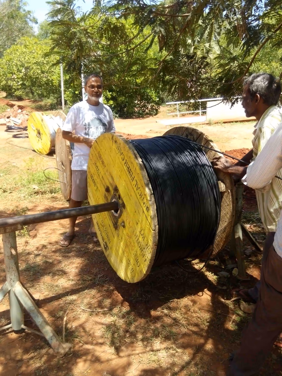 Chandresh supervising the laying of the optical fibre cable