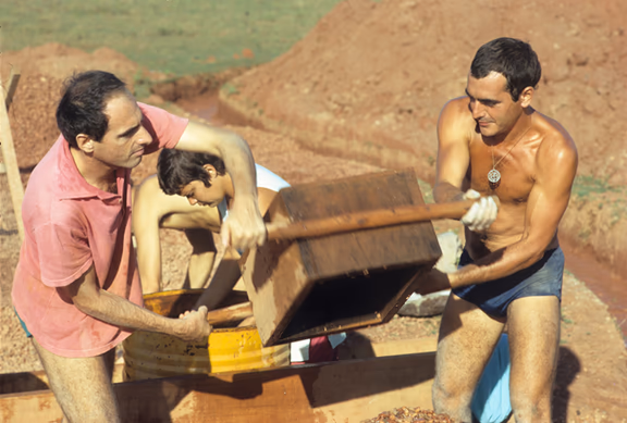 Gerard (right) in younger days, at work at the Matrimandir