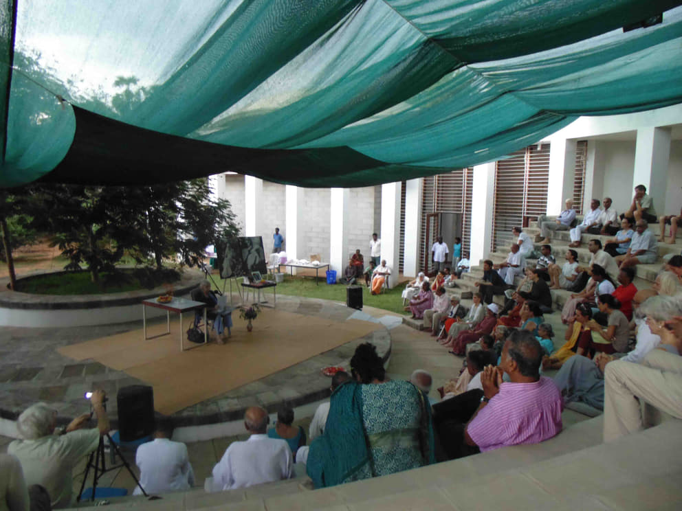 Shraddhavan taking a class at the Savitri Bhavan amphitheatre
