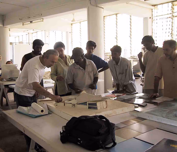 The late Roger Anger (left) examining a model