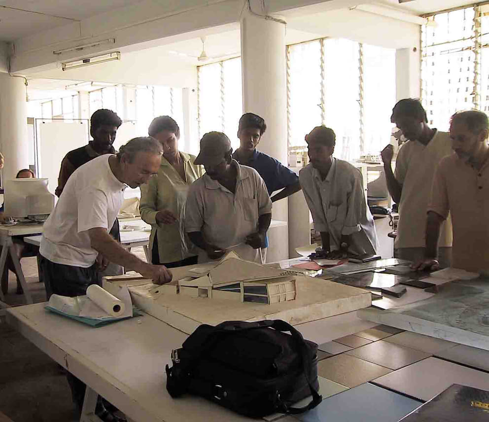 The late Roger Anger (left) examining a model