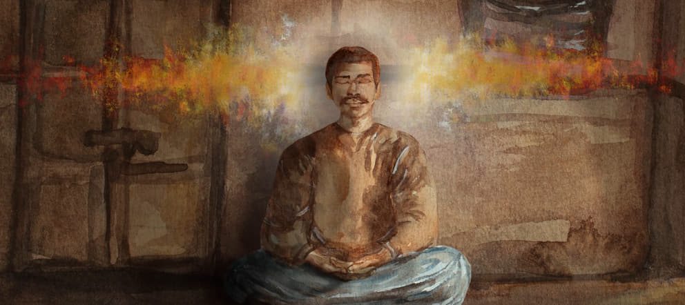 A still from the film Sri Aurobindo and The Earth’s Future showing Sri Aurobindo meditating in the dim, dust-laden storeroom on the first floor of Motilal Roy's house in Chandernagore